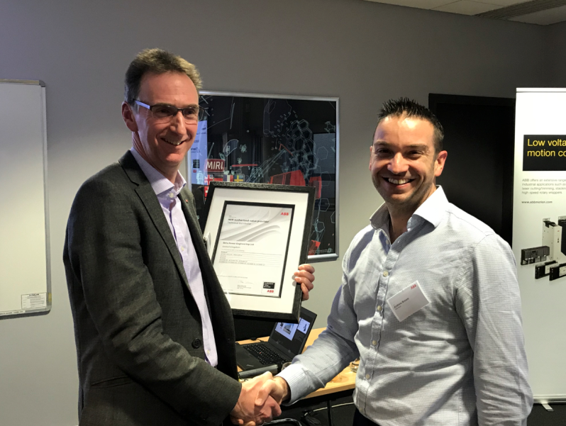 (L to R) Peter Myatt, ABB Channel Manager – Drives congratulates Beta Power‘s managing director Andrew Brown
