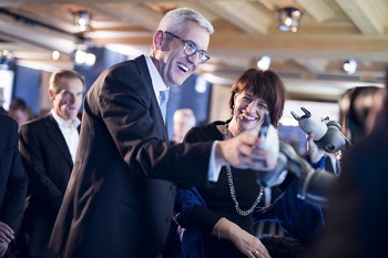 ABB CEO Ulrich Spiesshofer shows off ABB’s dual arm robot YuMi to Swiss Federal Councilor Doris Leuthard at ABB’s annual WEF event