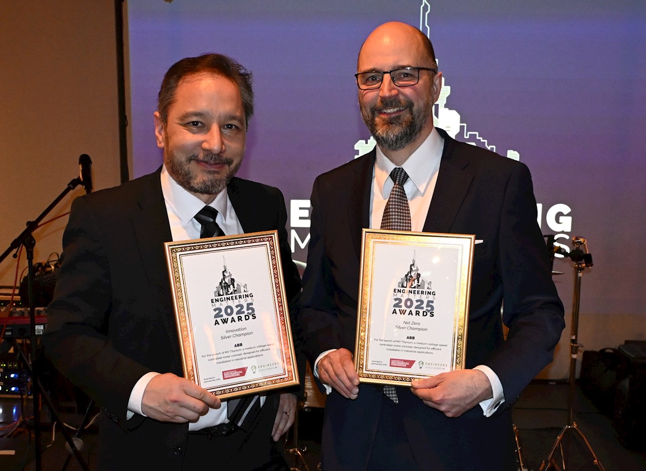 John Shibutani, Head of Product Management and Technology, and Pekka Mannila, R&D Manager, with the award certificates