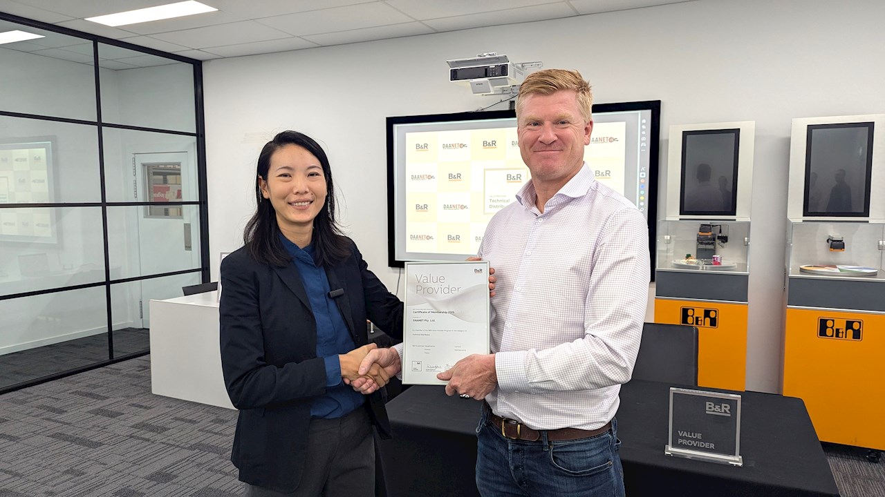Naomi Khoo, B&R Industrial Automation Business Development Manager for Australia & New Zealand (left), presents Adrian Matthews, Managing Director at DAANET for Australia & New Zealand, with the B&R Authorised Value Provider certificate and plaque.