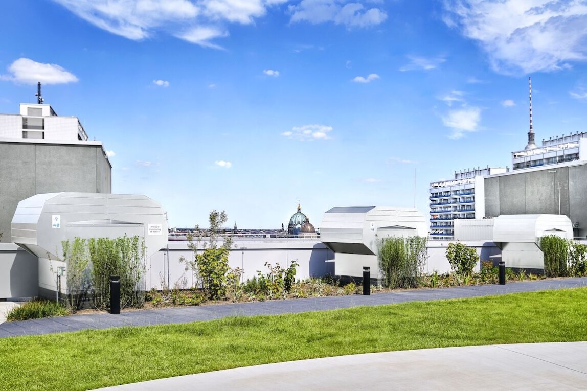 BVDAX axial smoke extraction fans from TROX X-FANS are controlled by ABB frequency converters and feature a fully thermally insulated casing that seals tightly against the building envelope. Image: Trox X-Fans GmbH.