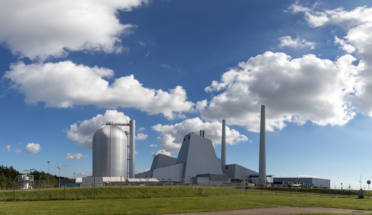 Avedoere power plant with a thermal energy storage tank, south west of Copenhagen, Denmark. The plant's thermal energy storage system allows electricity production when prices are high and storing surplus heat for later use. 
 
